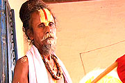 Sadhu doing pankha.